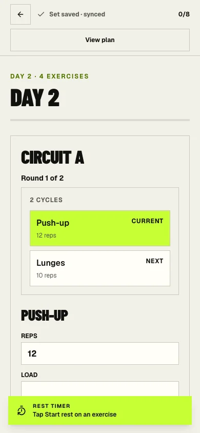 SheetFit timed workout screen for logging sets, reps, load, and rest